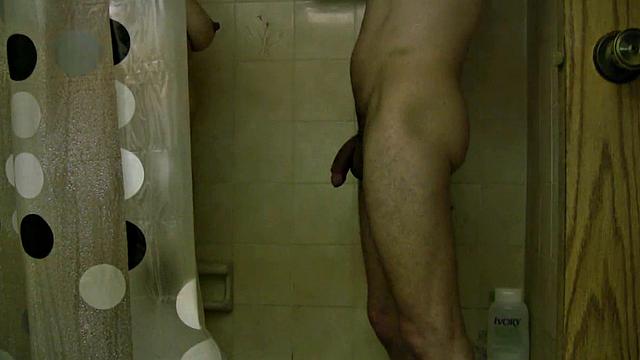 Naughty Shelly flaunts her natural tits in a steamy shower with Shower Nude