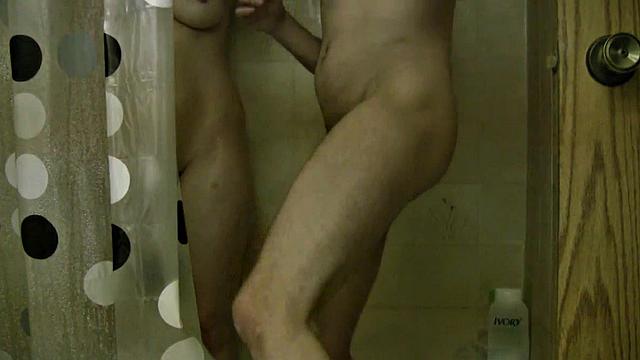 Naughty Shelly flaunts her natural tits in a steamy shower with Shower Nude