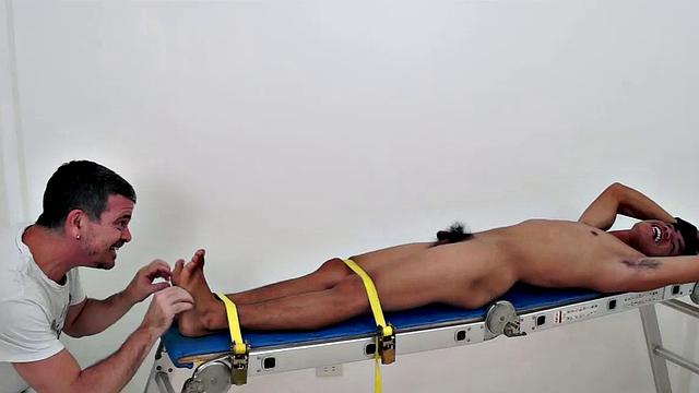 I know it's been a while since I've gotten in front of the camera, but I just had to get my fingers and feathers on this hot and sexy cute Asian boy's awesome smooth ticklish soles! So I strapped this cutie down on the rack and had my tickling