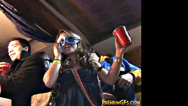 Sexy babe enjoying herself at a party, showing her tits