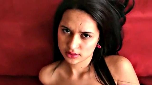 Watch Lilly's natural tits bounce as she fingers her tight pussy on the couch