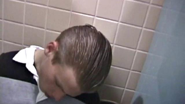 We catch up with Christian on an outdoor stairway. He leads us to a men's room with glory holes. Tere, Christian jacks off to photos in a straight porn magazine.