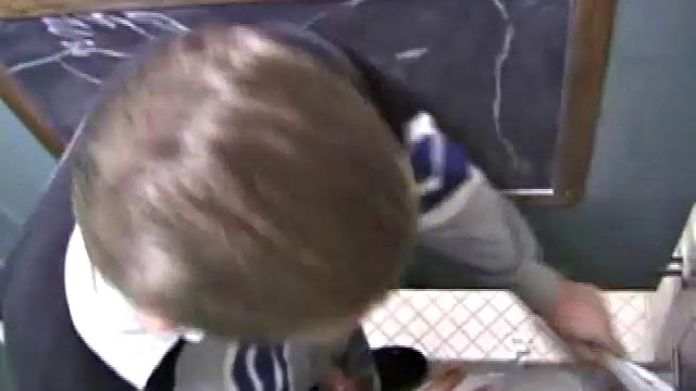 We catch up with Christian on an outdoor stairway. He leads us to a men's room with glory holes. Tere, Christian jacks off to photos in a straight porn magazine.