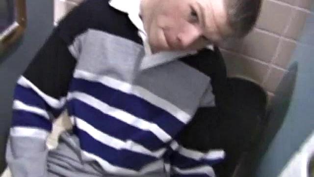 We catch up with Christian on an outdoor stairway. He leads us to a men's room with glory holes. Tere, Christian jacks off to photos in a straight porn magazine.