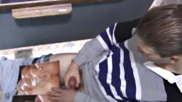 We catch up with Christian on an outdoor stairway. He leads us to a men's room with glory holes. Tere, Christian jacks off to photos in a straight porn magazine.