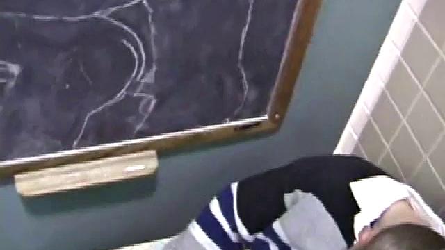 We catch up with Christian on an outdoor stairway. He leads us to a men's room with glory holes. Tere, Christian jacks off to photos in a straight porn magazine.