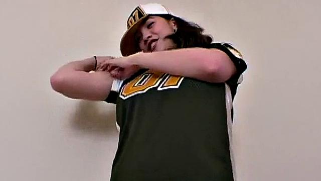 Busty teen strips off American jersey