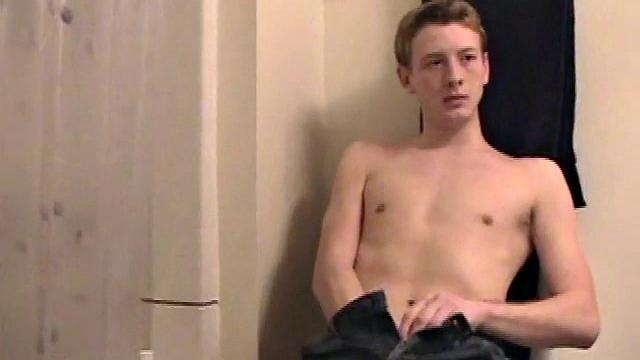 Sitting on the toilet, shirtless Corbin works his cock inside his pants. Then he tugs down his jeans and boxers before he's fully hard, which gives us the pleasure of watching him lube up and grow a stiffy.
