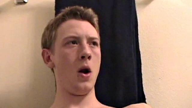 Sitting on the toilet, shirtless Corbin works his cock inside his pants. Then he tugs down his jeans and boxers before he's fully hard, which gives us the pleasure of watching him lube up and grow a stiffy.