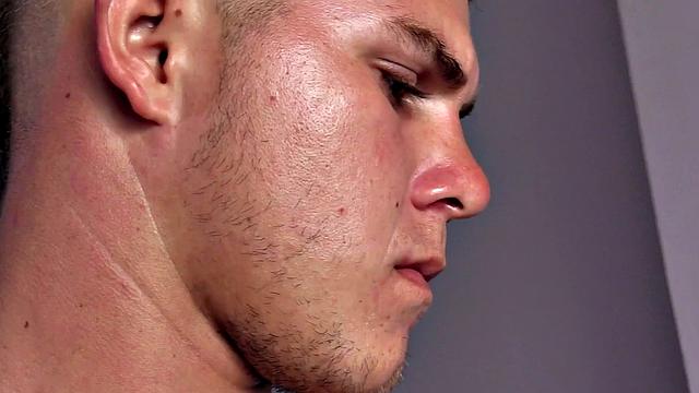 Dyron is a horny young man, who strips naked and works up a stiff one, while watching some porn on his phone. Once he's worked up and ready to go, Dyron kicks back on the bed and starts beating off.