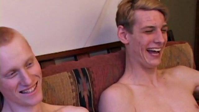 Richard, Kaos and Skylerr turn on some porn and start grabbing their crotches, before stripping naked. After passing the lube around they stroke their boners.