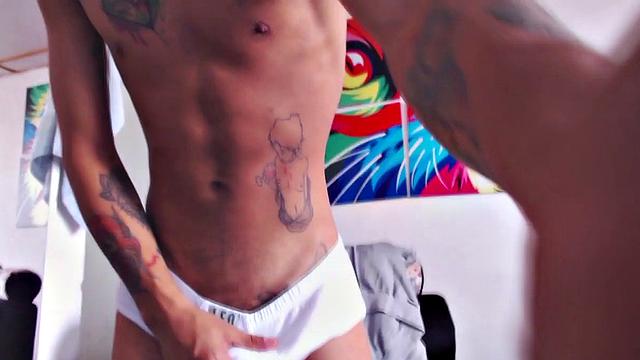 Juan slowly strips out of his T-shirt, as he works on getting himself hard. Once naked, the skinny and inked Latino kicks back and starts stroking his stiff dick.