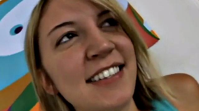 Petite blonde slut gobbles cock