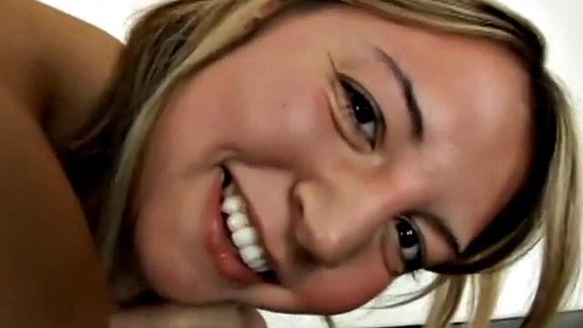 Petite blonde slut gobbles cock