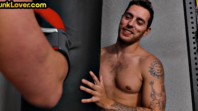 Sportive athletic jock barebacks bottom in gym after boxing