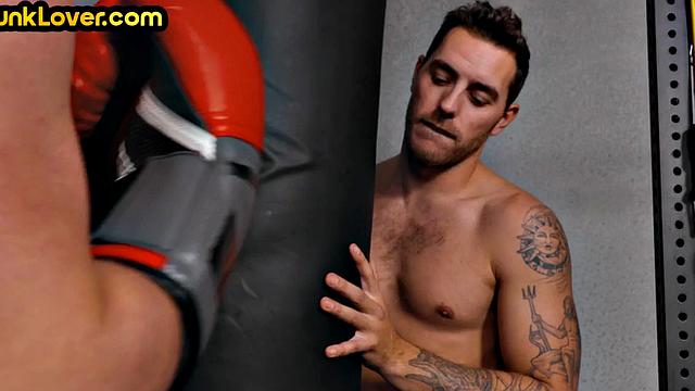 Sportive athletic jock barebacks bottom in gym after boxing