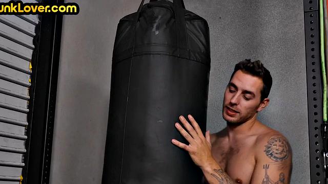 Sportive athletic jock barebacks bottom in gym after boxing