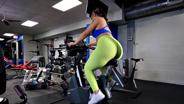 Watch this tattooed gym babe take a massive rod in her wet pussy from behind