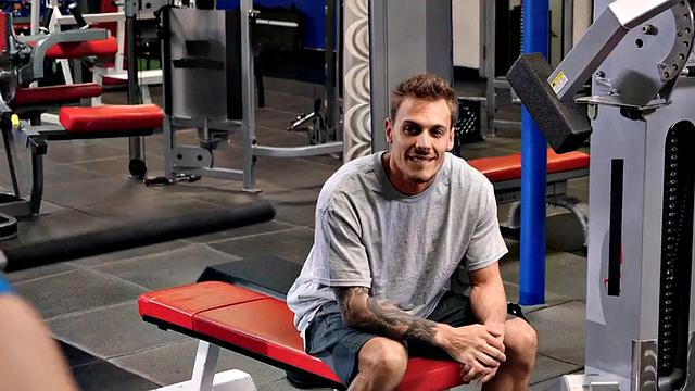 Watch this tattooed gym babe take a massive rod in her wet pussy from behind