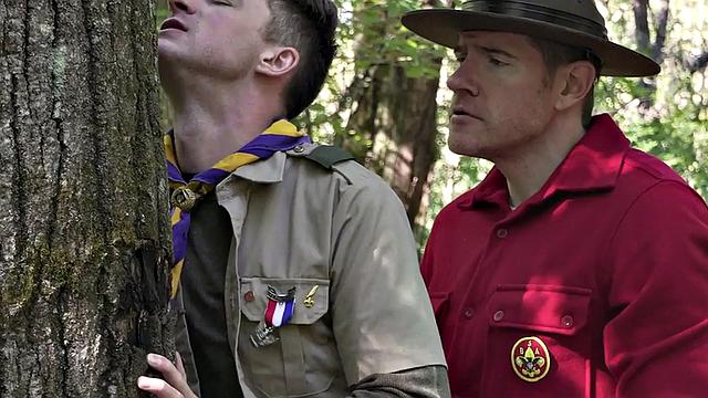 DILF scout fucks twink outdoors while voyeur watches