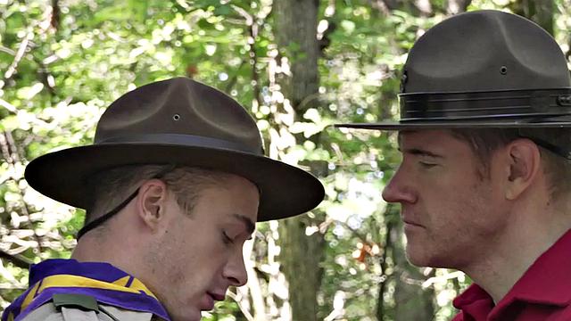 DILF scout fucks twink outdoors while voyeur watches