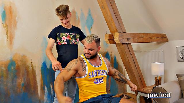 muscular guy dominates another man in hot gay action