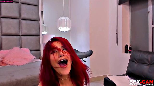 Red haired lady is extremely horny and moans from pleasure