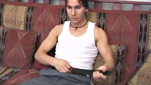 Brock Labelli takes off his clothes and starts playing with his dick. He spreads lube on his cock and looks down at it. Then he rubs the head and tightens his abs and thighs while feeling his balls.