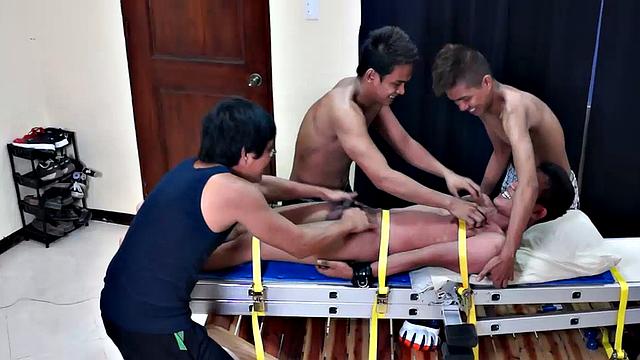 This cute and ticklish Asian twink is strapped down to the tickling rack as Benjamin, Willy, and Ricky take turns putting him through the tickle torment of his life. Each tickler takes his turn driving Warren to hysterics with methods.