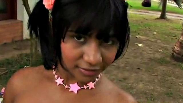 Tobie Teen gets naughty in a garden, stripping off to show her small tits and great ass. She rubs her tits and fingers pussy