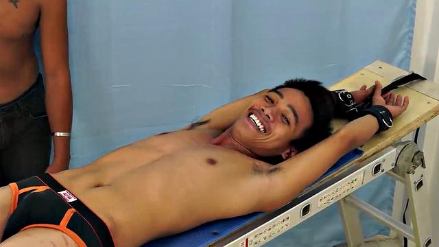 Introducing cute and ticklish Asian twink Jojo. This is his first shoot with Laughing Asians. Our long haired Asian boy Hunter is the sadistic tickler who has strapped Jojo down on the tickle rack and puts gim through his first tickle experience.