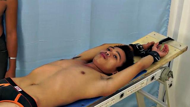 Introducing cute and ticklish Asian twink Jojo. This is his first shoot with Laughing Asians. Our long haired Asian boy Hunter is the sadistic tickler who has strapped Jojo down on the tickle rack and puts gim through his first tickle experience.