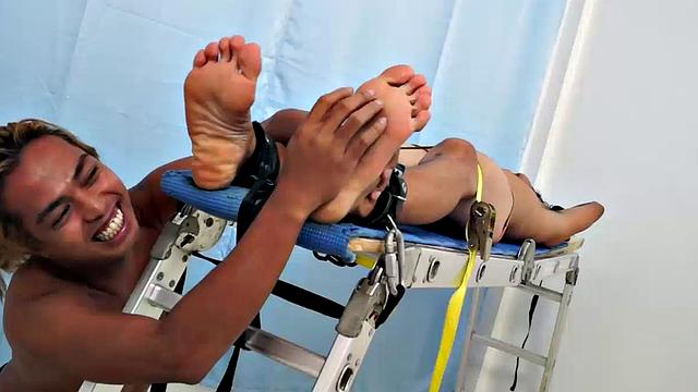 Introducing cute and ticklish Asian twink Jojo. This is his first shoot with Laughing Asians. Our long haired Asian boy Hunter is the sadistic tickler who has strapped Jojo down on the tickle rack and puts gim through his first tickle experience.