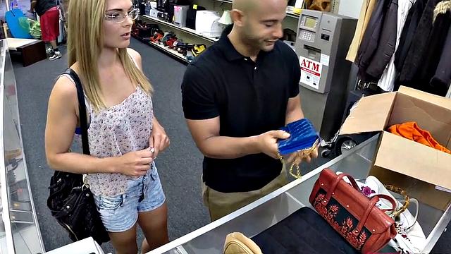 Pawnshop beauty sucking manager's cock before sex in the shop
