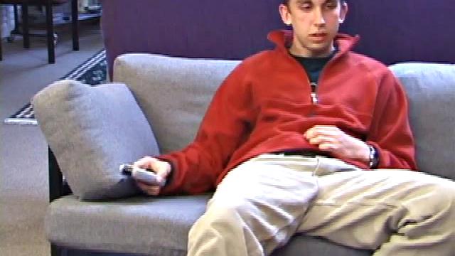 Chad Wiley releases a huge uncut cock and probes his hole.