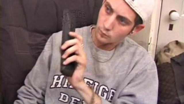 As a porn flick plays, young amateur Aaron Michaels strokes hard, pulls his cock out of his jeans, lets loose, and spills his nut on the bed.