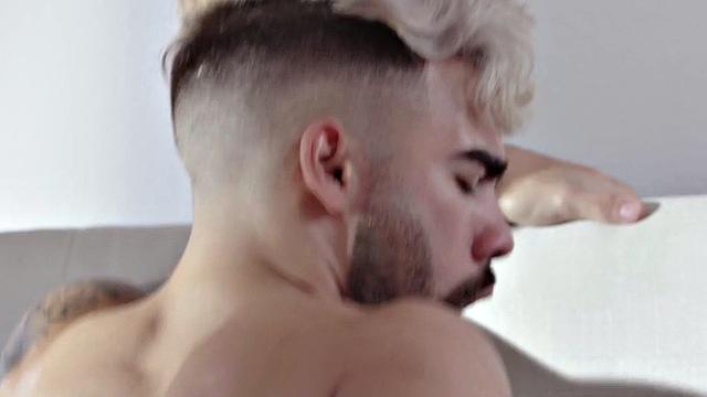 Muscular black dude fucks white guy's ass while kissing passionately