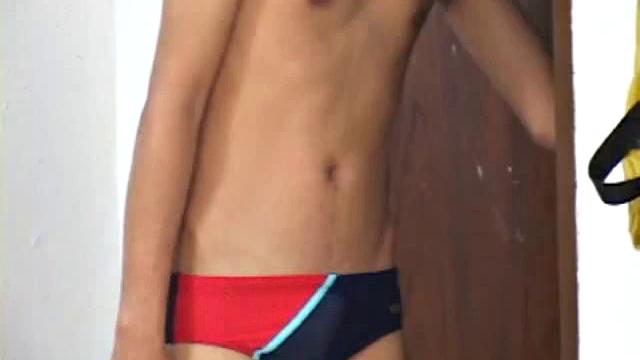 Big is working pool job when Moo gives him the eye. Sneaking off to the staff dressing room they stand together in their tight swim suits kissing and caressing each other's tight.