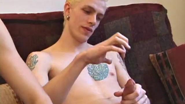 After they each work their bulge for a while, Roar is the first to lend a hand, and then a mouth. By the time they both strip and stroke side-by-side, Shane has already produced major leakage, before going down on Roar.