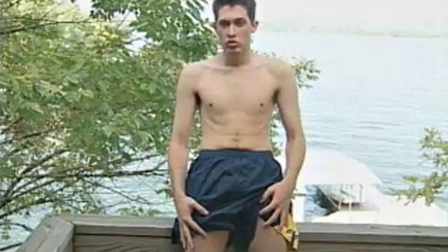 On a warm summer day, 20 year old Carrigan steps out onto the deck and starts caressing himself. The young man then moves to the bedroom, and continues in front of a full-length mirror.