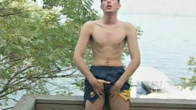 On a warm summer day, 20 year old Carrigan steps out onto the deck and starts caressing himself. The young man then moves to the bedroom, and continues in front of a full-length mirror.