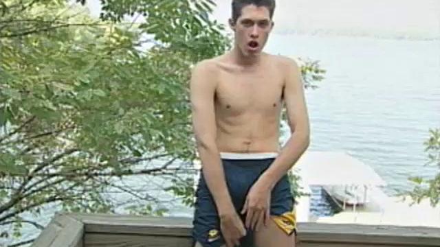 On a warm summer day, 20 year old Carrigan steps out onto the deck and starts caressing himself. The young man then moves to the bedroom, and continues in front of a full-length mirror.