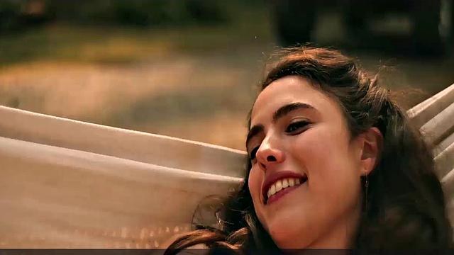 Brunette bombshell Margaret Qualley enjoys outdoor kissing and topless sex in smiley indoor video