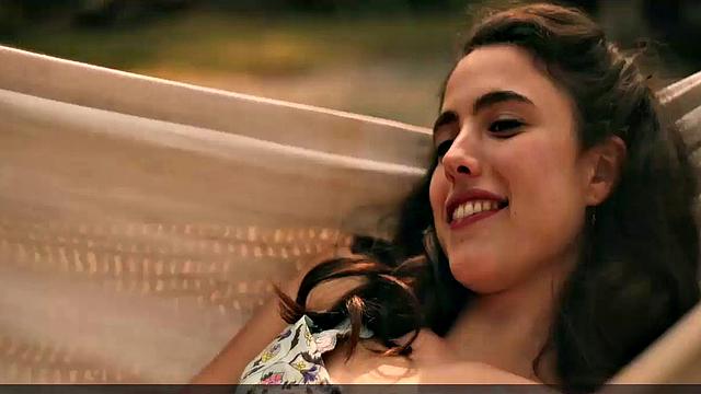 Brunette bombshell Margaret Qualley enjoys outdoor kissing and topless sex in smiley indoor video