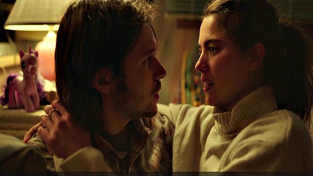 Brunette bombshell Margaret Qualley enjoys outdoor kissing and topless sex in smiley indoor video