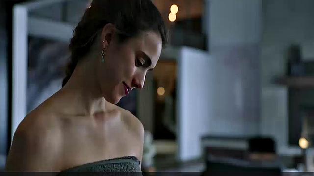 Brunette bombshell Margaret Qualley enjoys outdoor kissing and topless sex in smiley indoor video