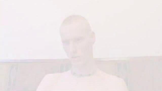 Bummed out by a broken skateboard, Kaos pulls out his lube and pops in a porn video. After stripping naked, he strokes his huge cock and spews a warm cum load onto his chest.