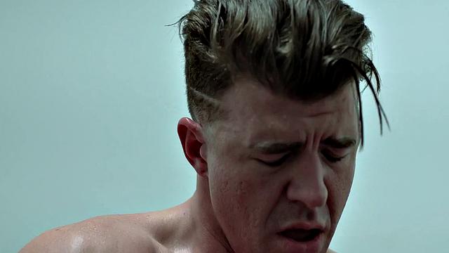 Muscled tattooed barebacks colleague in restroom