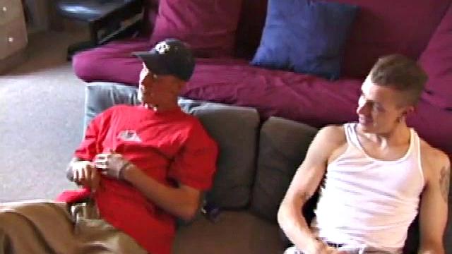 Shane and Brandon are naked and jerking off next to each other while watching a lesbian porn video. Shane spends a lot of time on his knees stroking his cock beside Brandon's slippery dick.