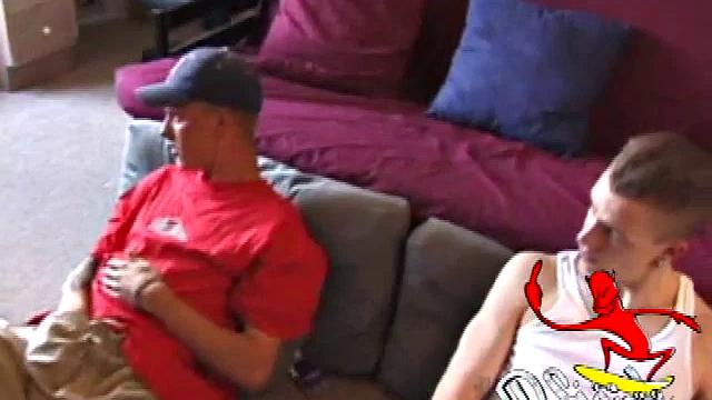 Shane and Brandon are naked and jerking off next to each other while watching a lesbian porn video. Shane spends a lot of time on his knees stroking his cock beside Brandon's slippery dick.